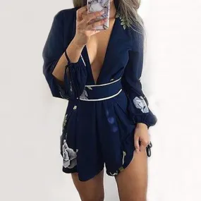 BACKLESS NAVY FLORAL ROMPER