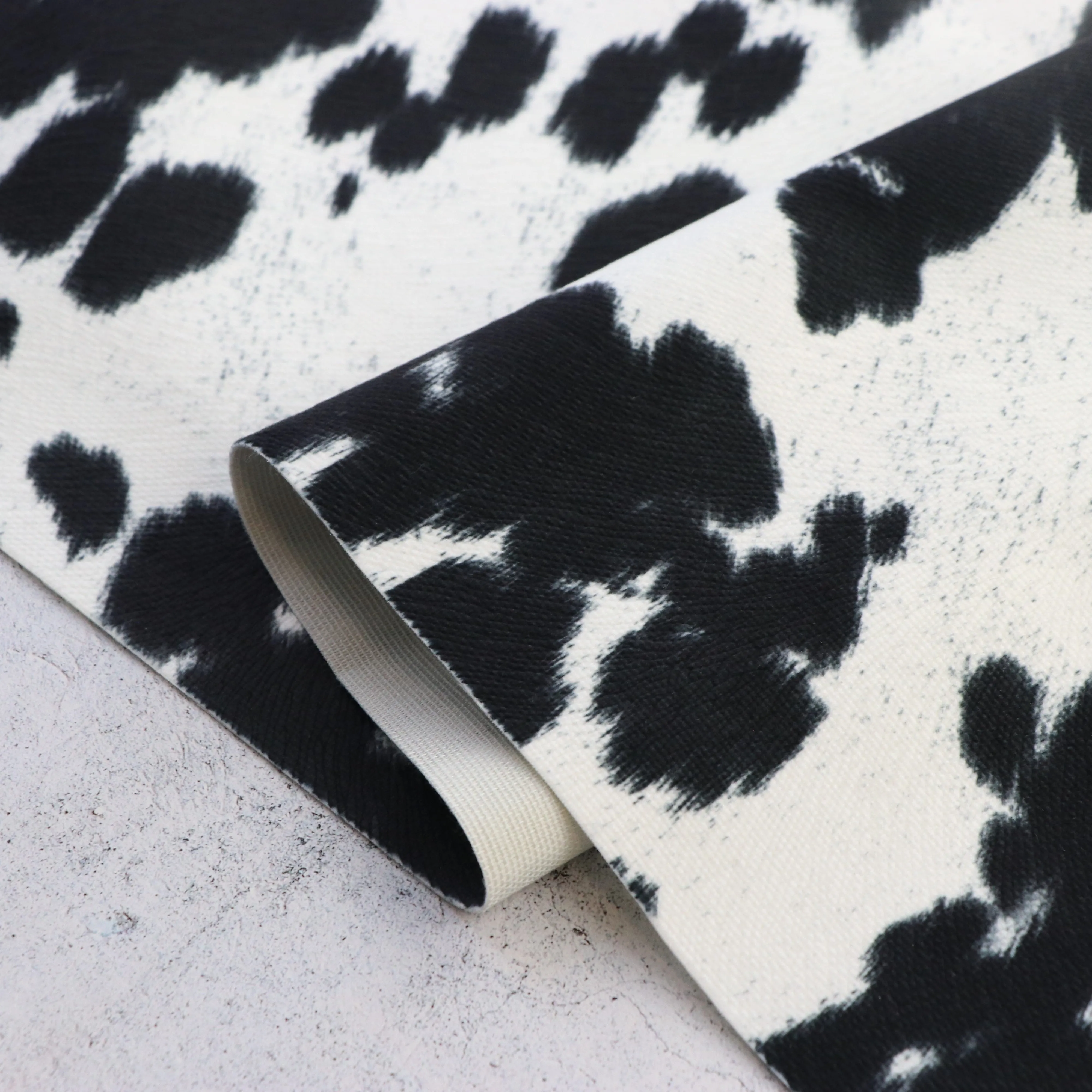 Cow Cream Black Faux Fur