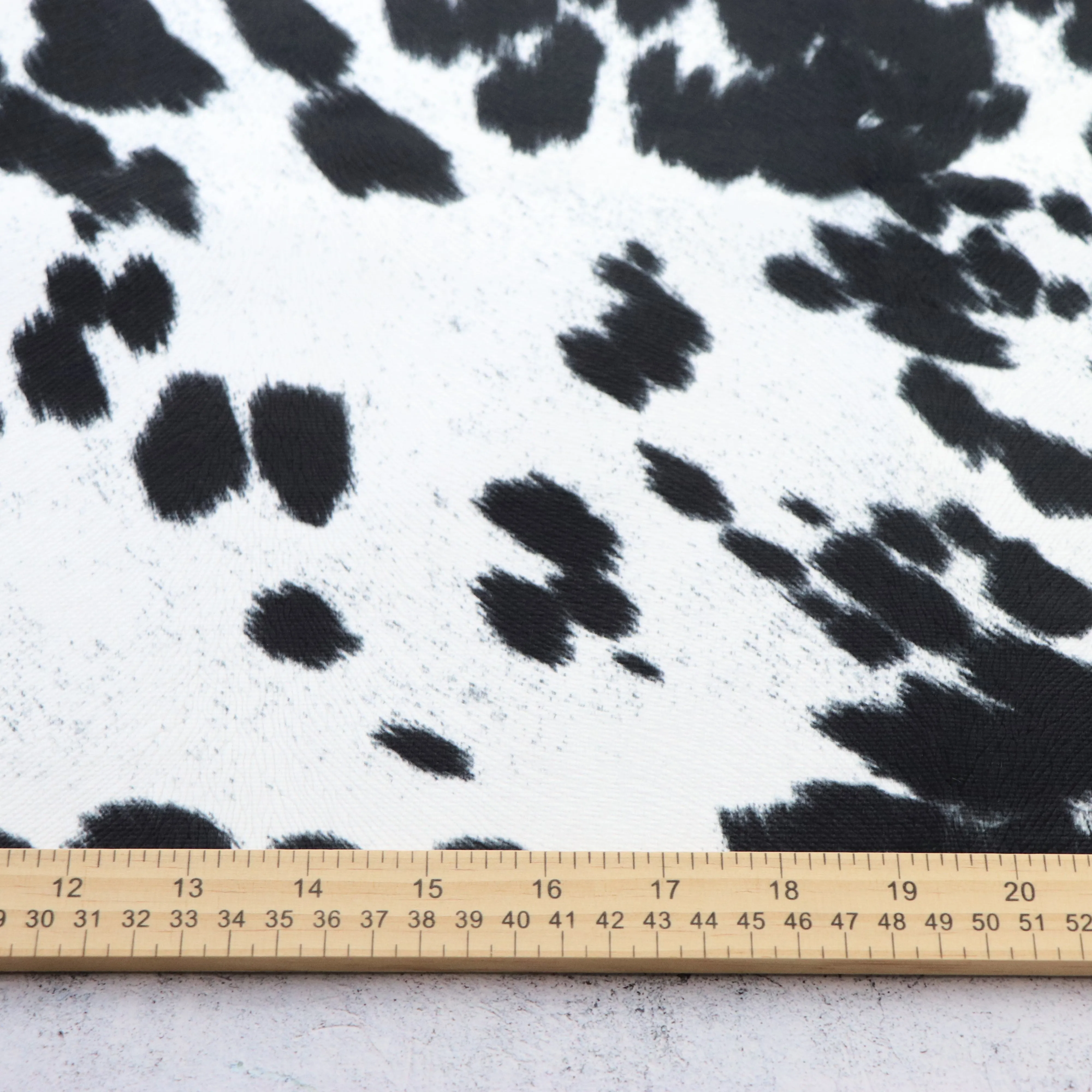 Cow Cream Black Faux Fur